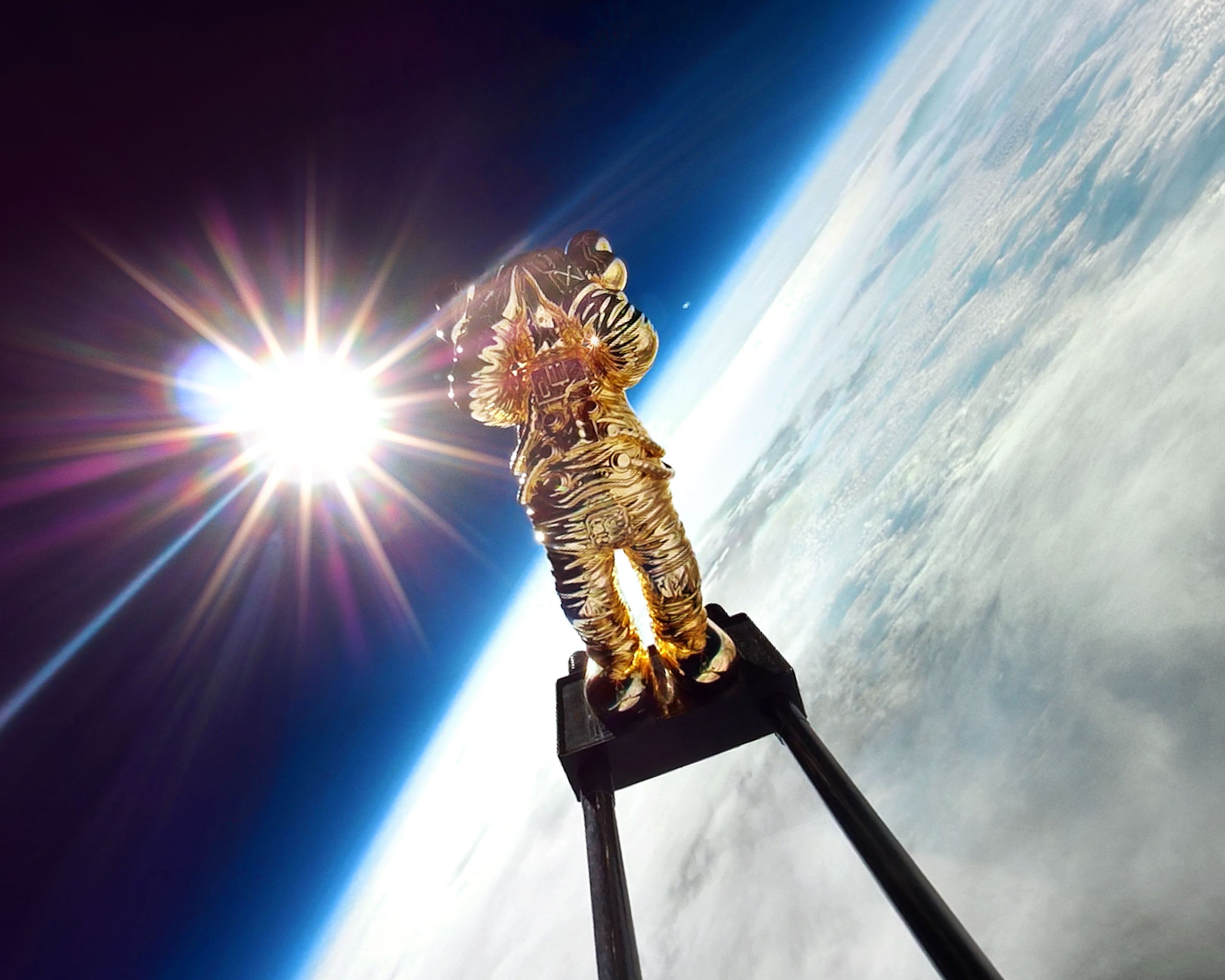 KAWS:HOLIDAY travels to space for its fifth stop.