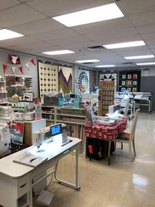 The new larger location of Blue Hen Quilt Shop has a spacious area for machine displays and demonstrations