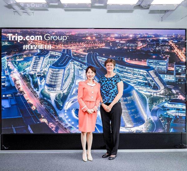 Trip.com Group CEO Jane Sun (left) meets with British Ambassador to China Dame Barbara Woodward (right) at Trip.com Group headquarters.