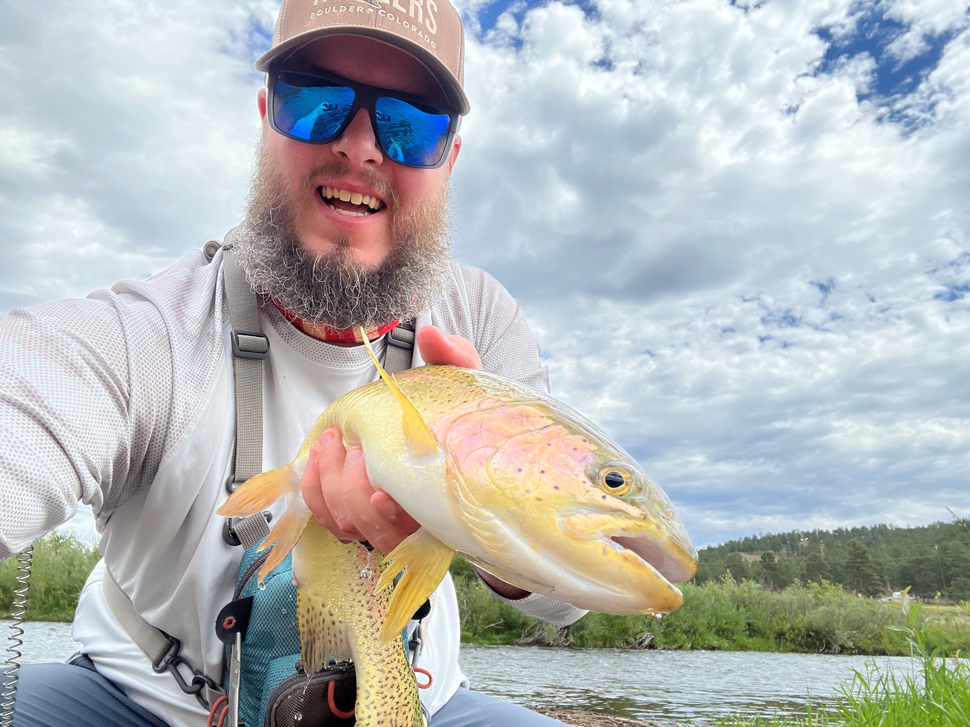 Air Anglers instructor, Flight Paramedic and Program Creator Mike Dvorak, grabs a selfie with a large trout caught near Deckers, CO