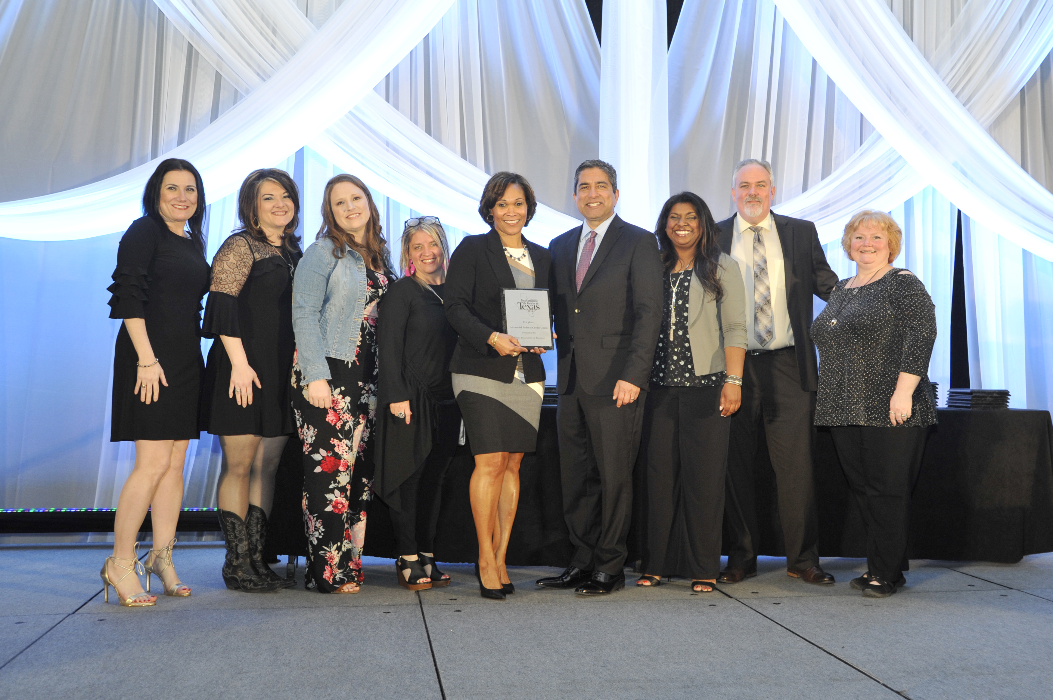 Advancial employees attended the Texas Association of Business (TAB) Best Companies to Work for in Texas Awards Dinner and Celebration on March 28 at the Hilton, Downtown Austin. From left to right: Danielle Best, Kristie Keatts, Liz Lopez, Cathy Lee, Olivia Thurmond, award presenter (name unavailable), Shali Huntley, Chris Wallace, Laurelle Campbell.