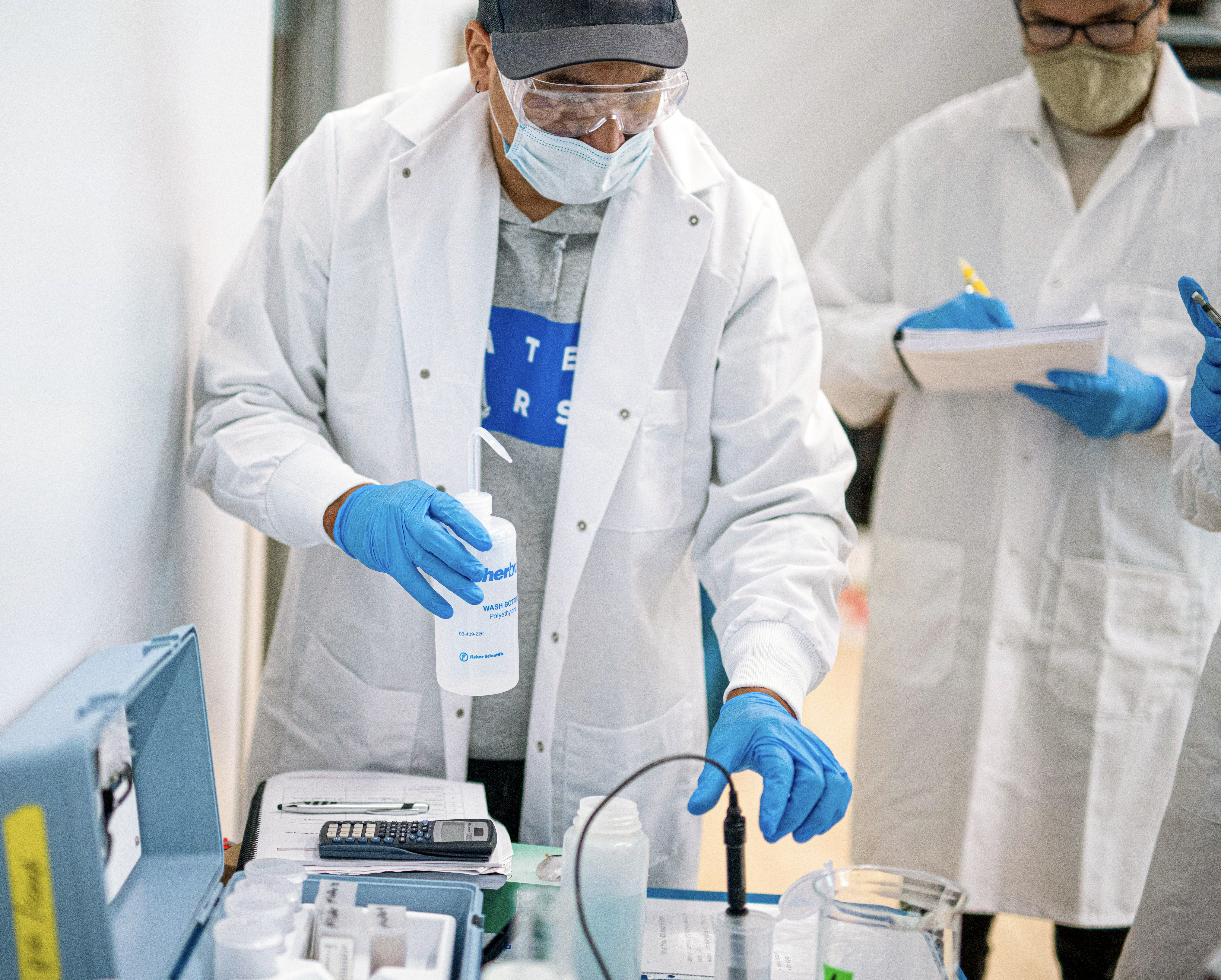 Water First interns practicing testing water samples with a variety of instruments during the Entry Level Course (ELC) week 2021