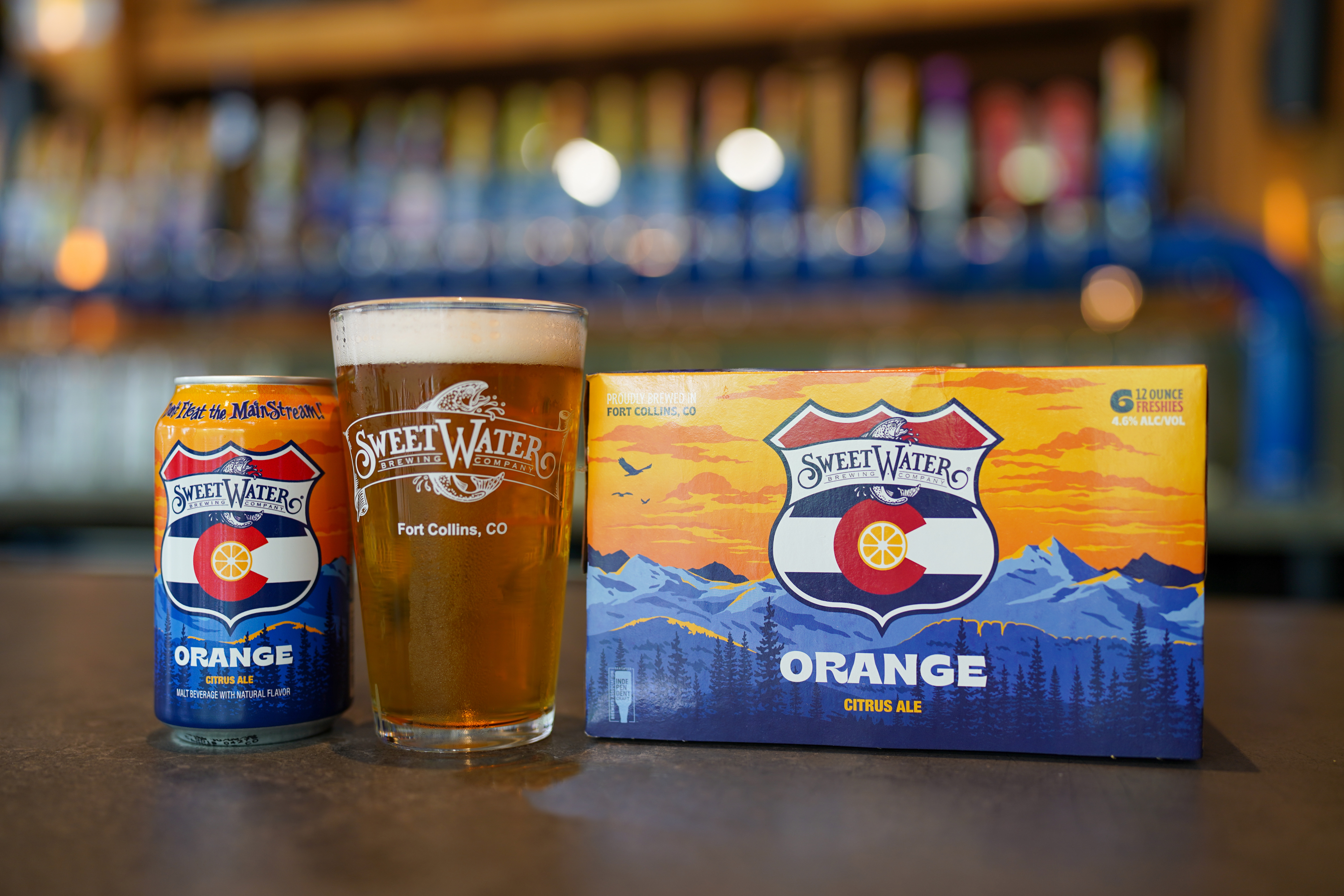 SweetWater ORANGE is brewed with Centennial hops and high-quality local wheat and craft malt from the Root Shoot Malting family farm in Loveland, Colorado. It is also infused with natural orange flavor for an especially easy-drinking experience. Pictured is the brand new 6-pack.