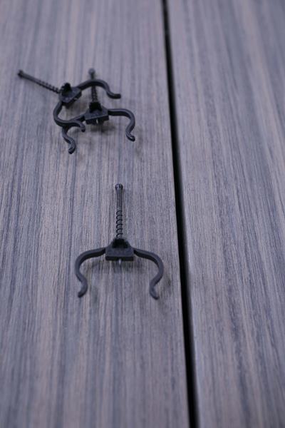 Deckorators, a leading manufacturer of composite decking, has approved CAMO’s EdgeClip™ and EdgeXClip™ fasteners for use with their grooved deck boards.Manufactured by National Nail, these fastener systems were designed with contractor input to help them quickly and efficiently fasten deck boards and achieve a fastener-free surface. Shown: Designed to hug the joist, EdgeClip won't slip or slide as you install grooved boards.
