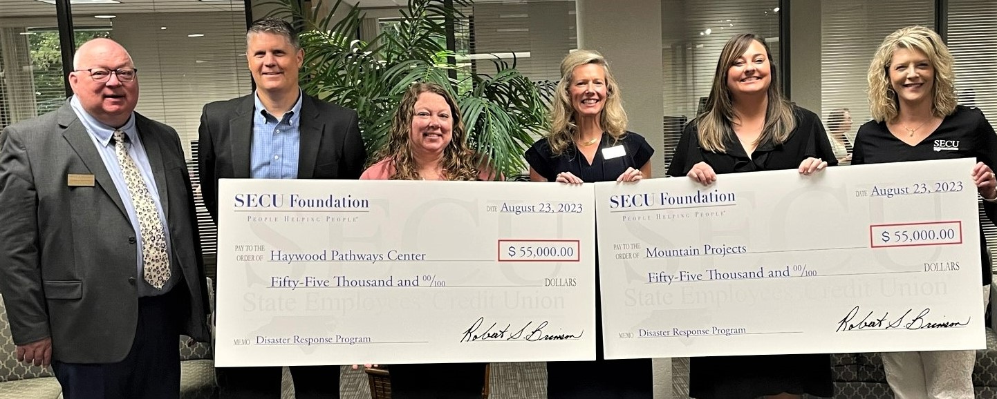 Left to right are Scott Southern, SECU Foundation director of Grants Administration; Jim Schwalm, SECU senior vice president, Sylva; Mandy Haithcox, Haywood Pathways Center executive director; Jama Campbell, SECU Foundation executive director; Brooke Smith, Mountain Projects assistant executive director; and Selena Williamson, SECU vice president, Waynesville.