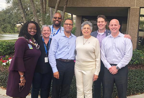 Carlotta Walls LaNier of the "Little Rock Nine" (third from right) is pictured with Ultimate Medical Academy President Thomas Rametta (far right), Head of Diversity and Inclusion Brian Fitzpatrick (second from right) and other members of UMA's Diversity and Inclusion Council after speaking at the institution during Black History Month.