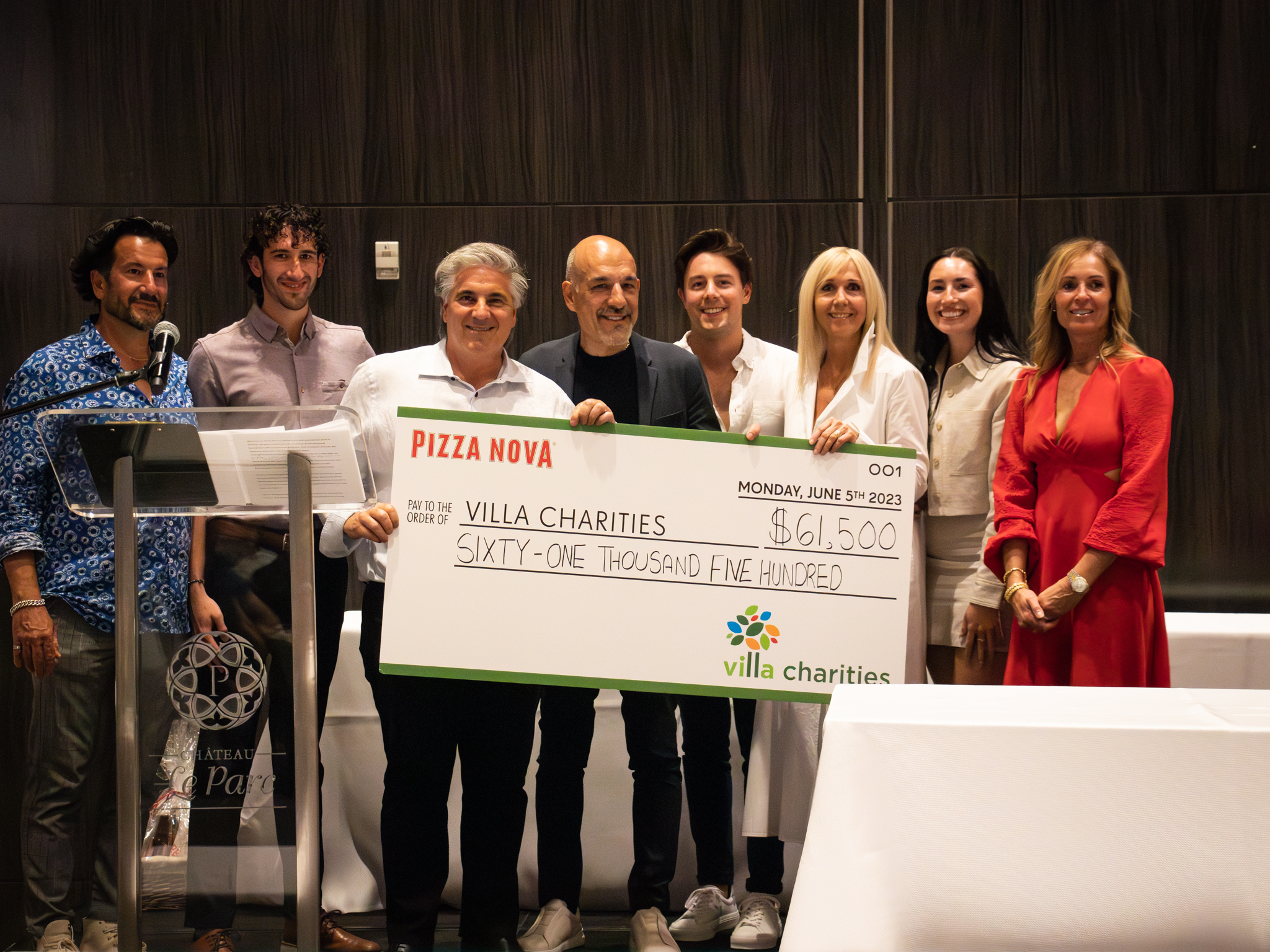 Domenic Primucci, president of Pizza Nova, presents a cheque for $206,847 to Karen Stintz, CEO of Variety The Children’s Charity of Ontario, at Variety Village, June 12, as a result of the 2023 “That’s Amore Pizza for Kids” fundraiser. 