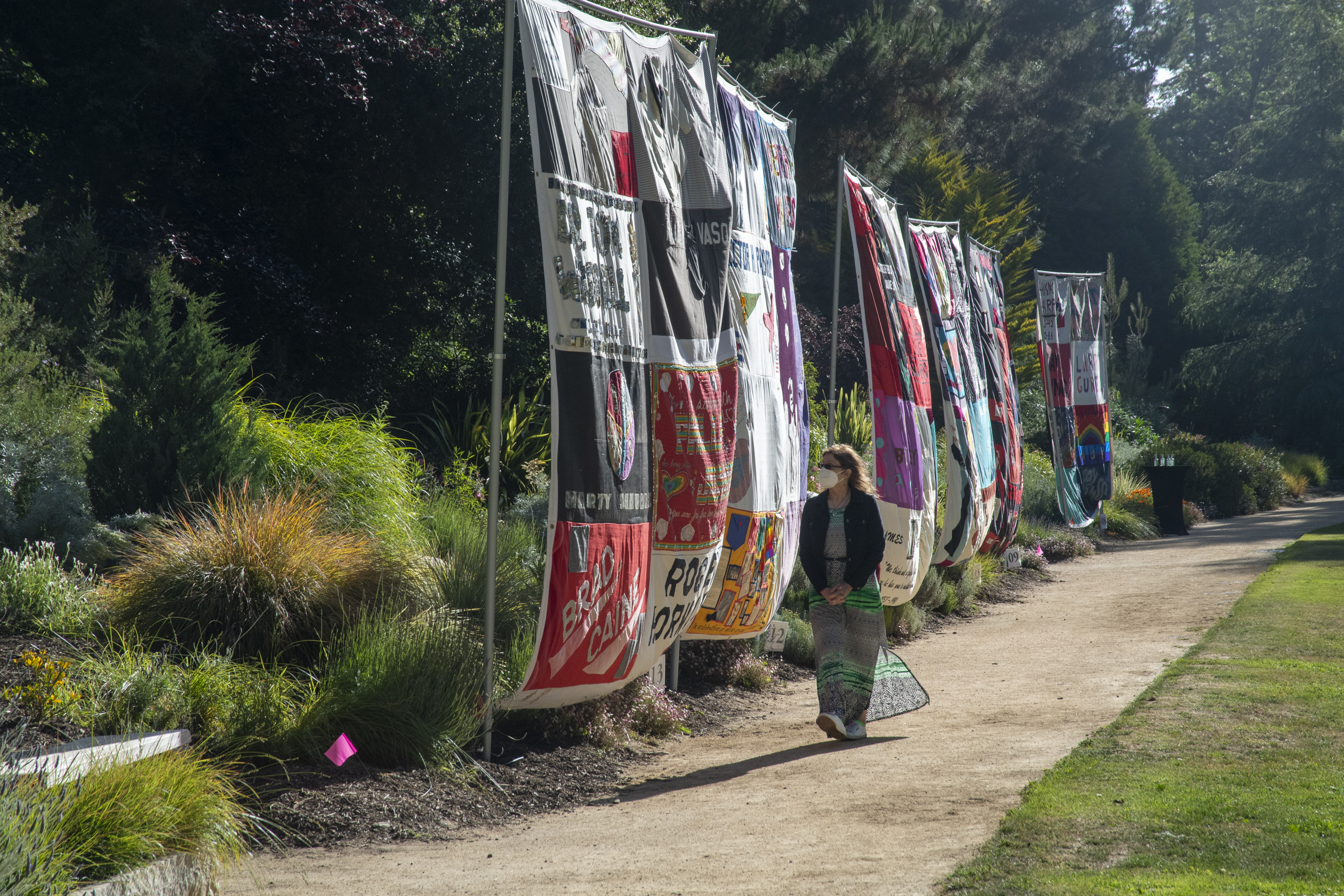 A visitor strolls through the National AIDS Memorial where 40 Quilt blocks were on display symbolic of 4 decades of the AIDS pandemic.