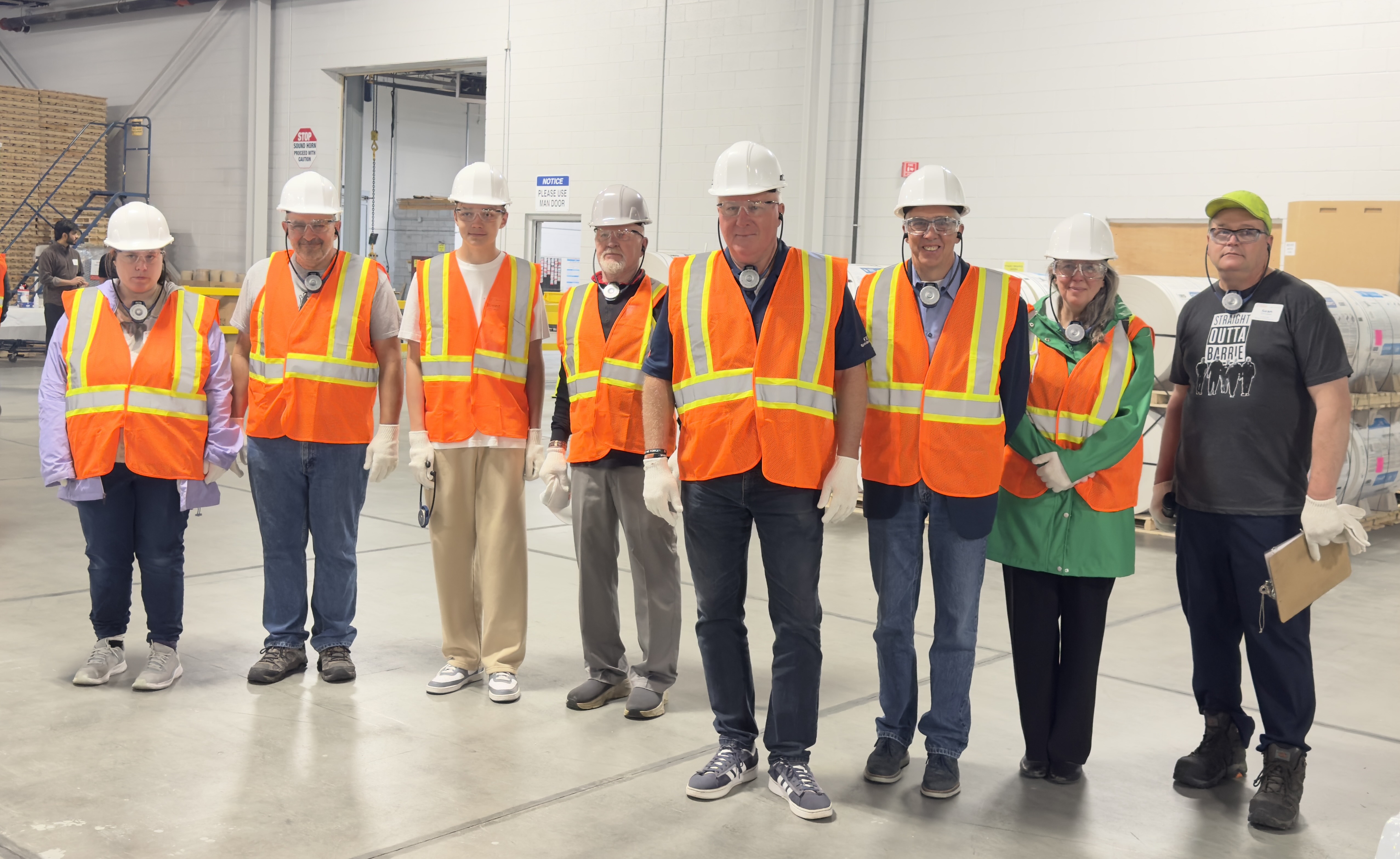 John Brassard (Member of Parliament for Barrie South–Innisfil), Guy Tremblay (Vice President of Operations, IKO North America) and other guests at the plant tour