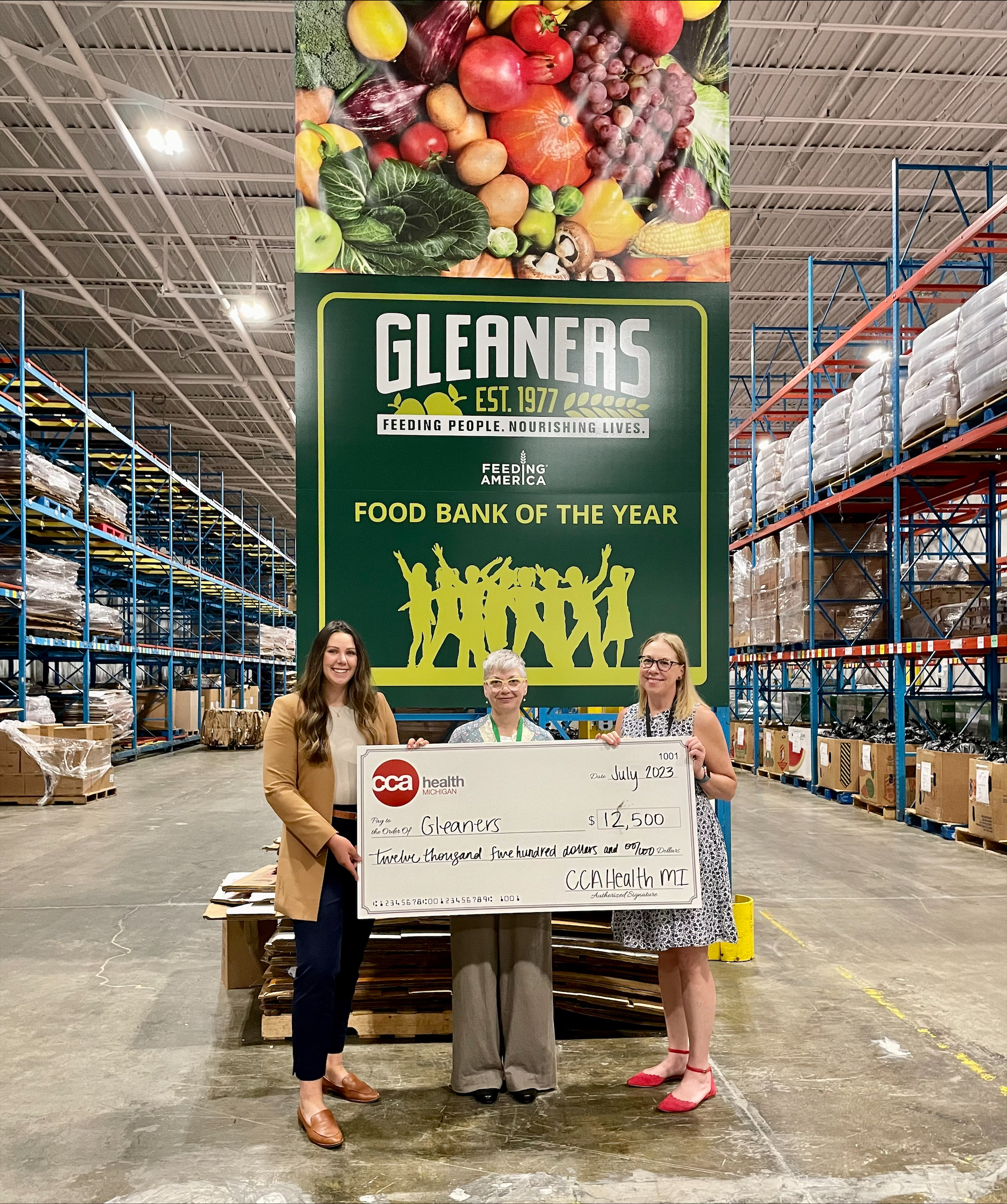 Presentation of donation to Gleaners Community Food Bank