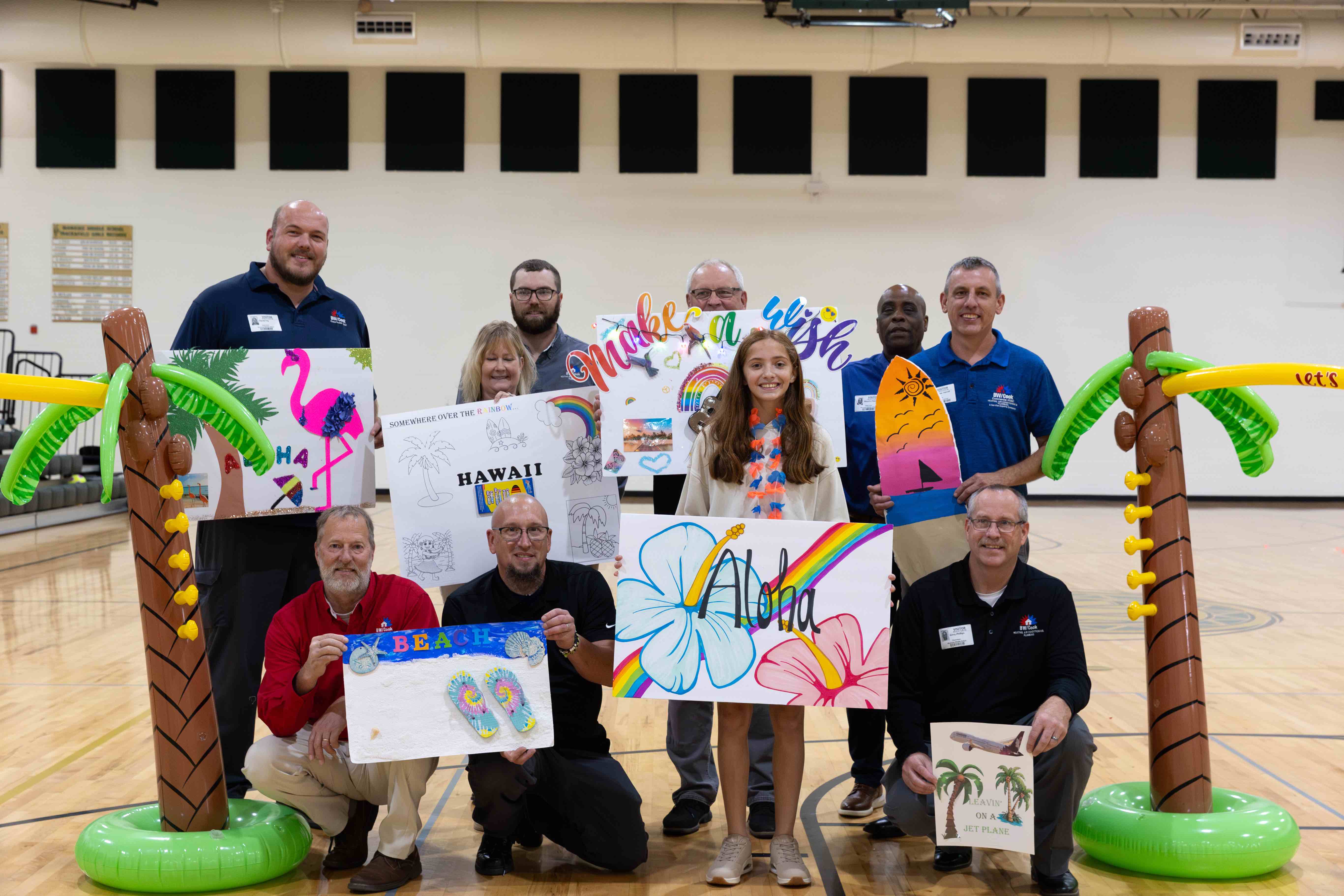 The team from BW/Cook Service Experts surprised Anna with homemade posters to celebrate her wish