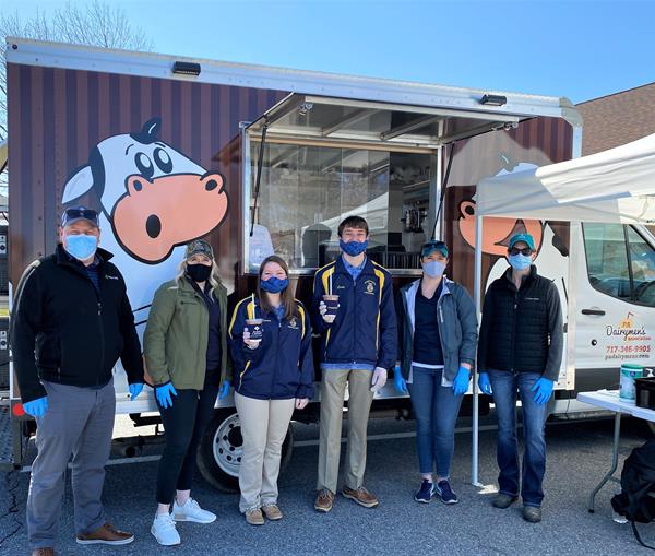 Farm Credit staff from the Mount Joy office and Pennsylvania FFA officers serving free milkshakes.