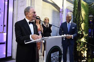 Former NYC Mayor Mike Bloomberg addresses attendees at the Museum of the City of New York’s Centennial Gala, while his daughter Georgina Bloomberg and his friends, Christine Baranski and NYC Mayor Eric Adams, look on (Photo credit - Ilya Savanok.JPG
