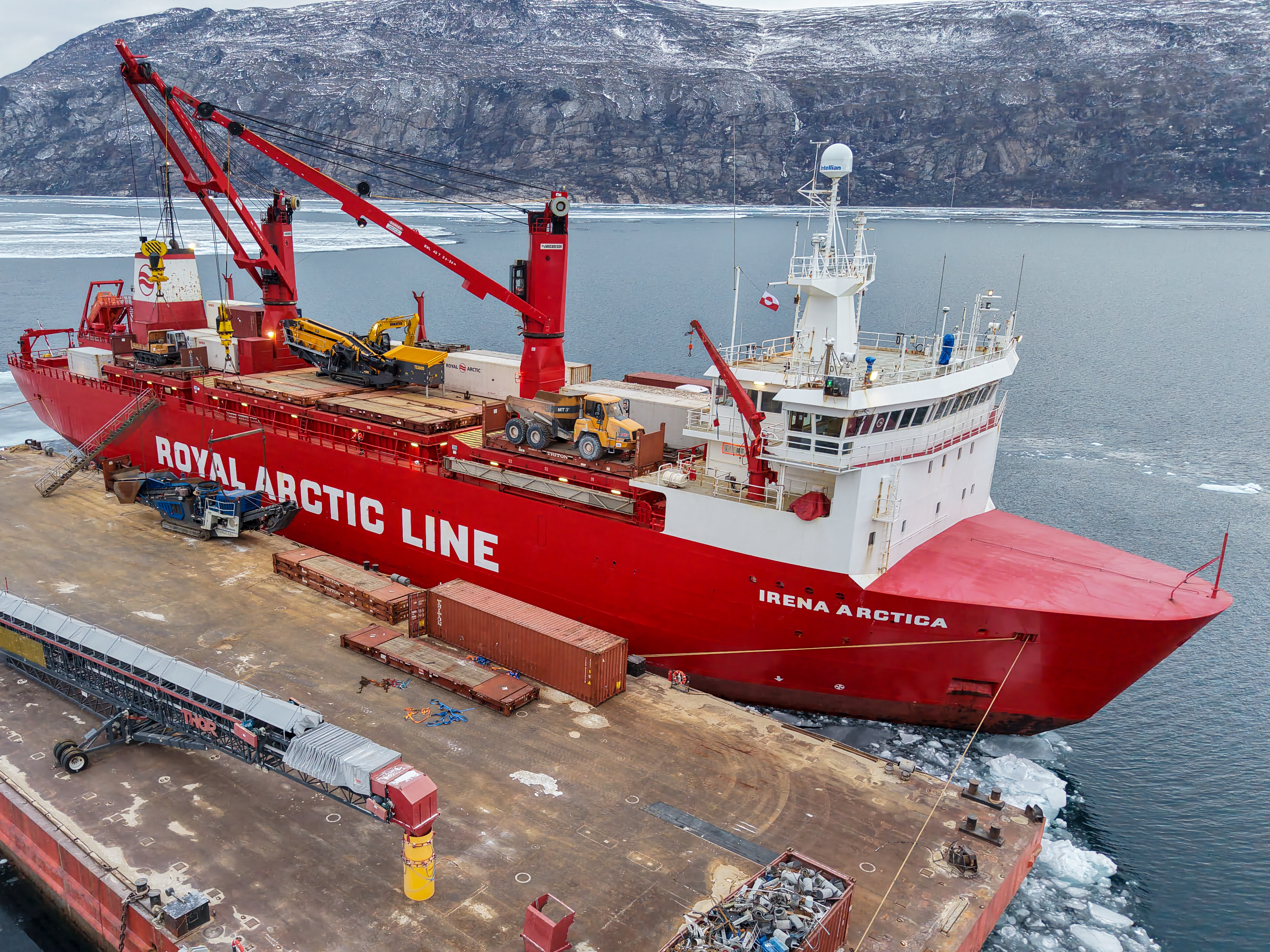 When the vessel arrived on January 25, the fjord was frozen solid, forcing the ship to break through the ice to reach the quay.