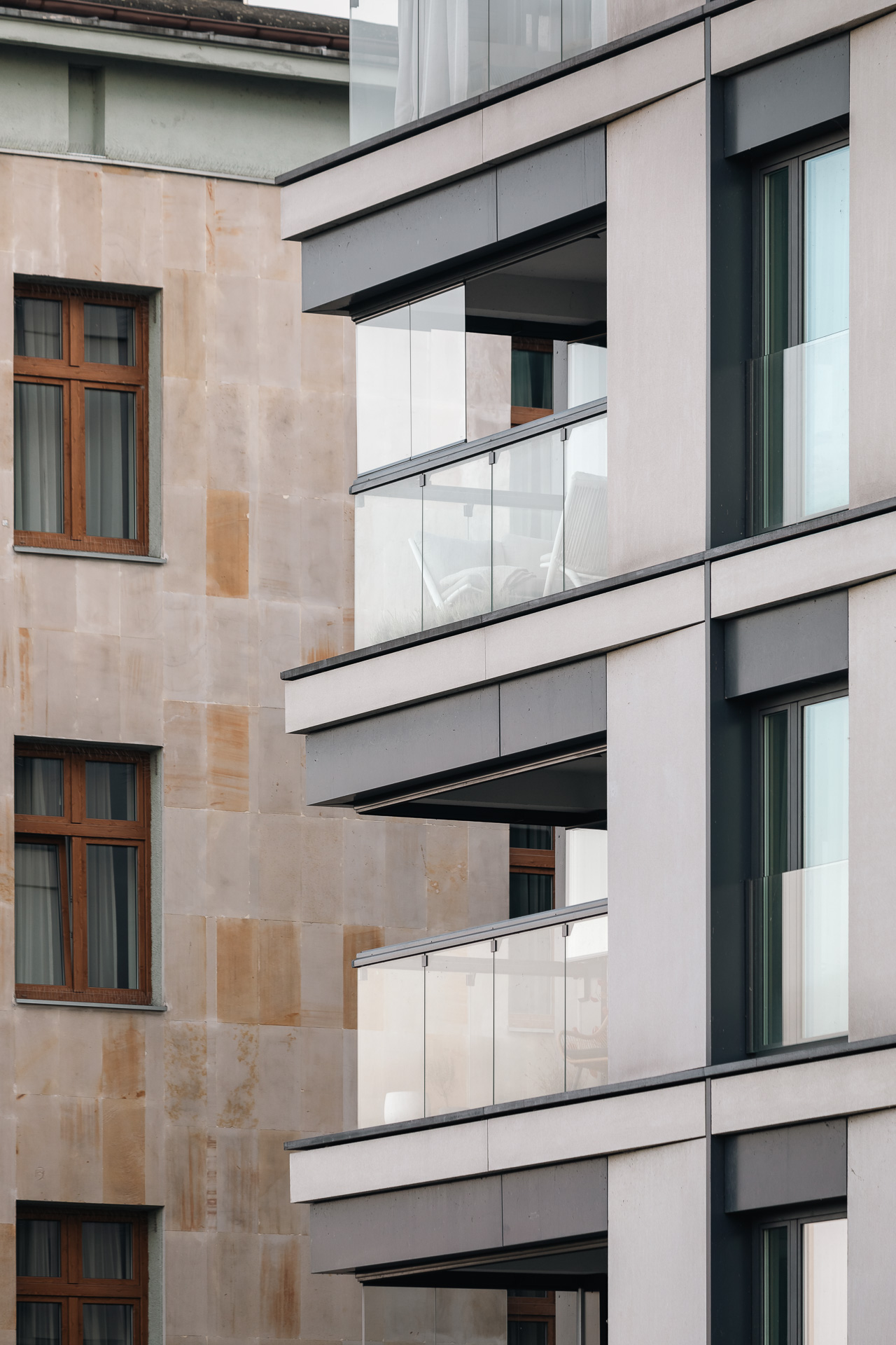 Close-up of Lumon’s frameless balcony glazing installed at the modern Flisac development in Warsaw, Poland.