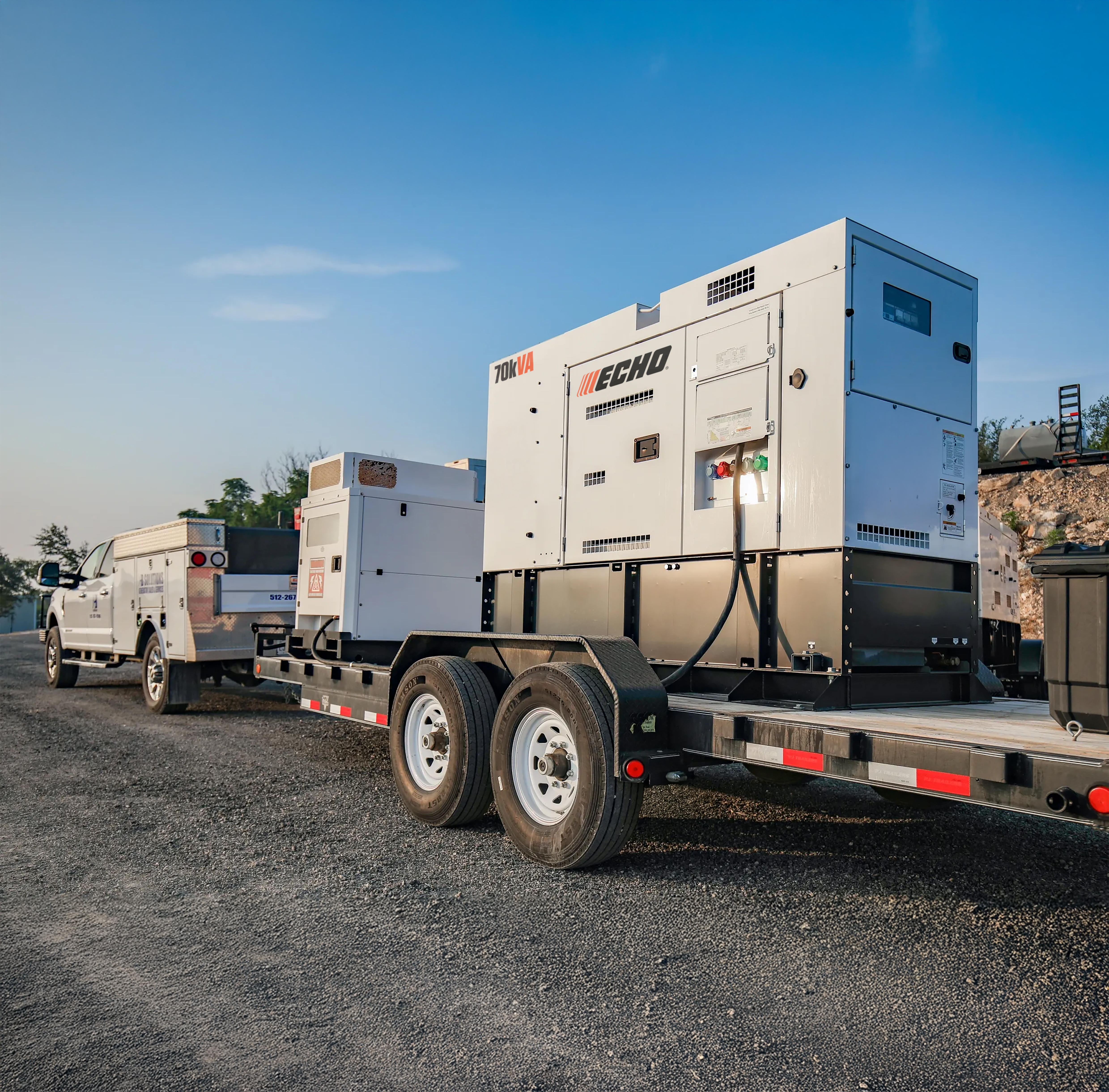 A ECHO DGK70F 70 kVA mobile diesel generator mounted on a trailer, ready to be deployed on a job site.
