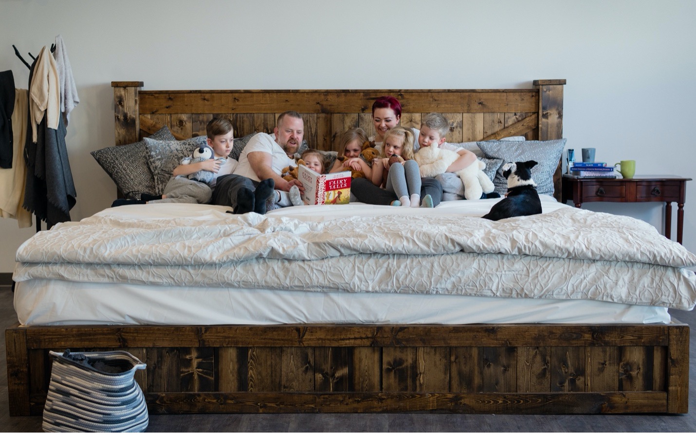 Family enjoys story time on a Von Viva Alaskan King sized mattress. These modular mattresses are highly customizable to multiple sleepers' preferences, e.g. firm on his side, softer on hers, and disassemble easily for moving and shipping.