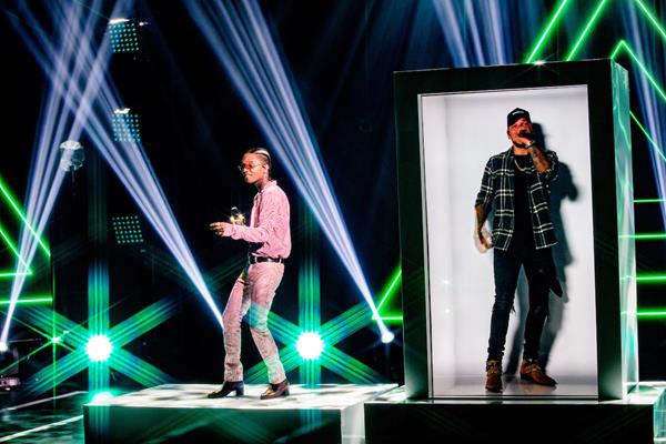 PORTL Hologram beamed Kane Brown from Nashville to L.A. to swing with Swae Lee and Khalid at the iHeartRadio Music Festival on The CW Network September 27 and 28. It was the first use of PORTL, the only life-sized, single-passenger holoportation device, by a major artist. 
