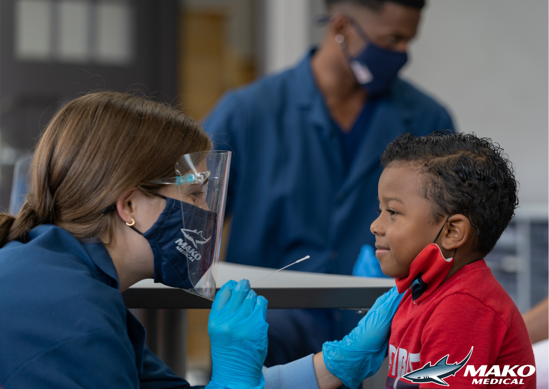 July 2021, MAKO Medical team members conducting COVID-19 K-12 tests.