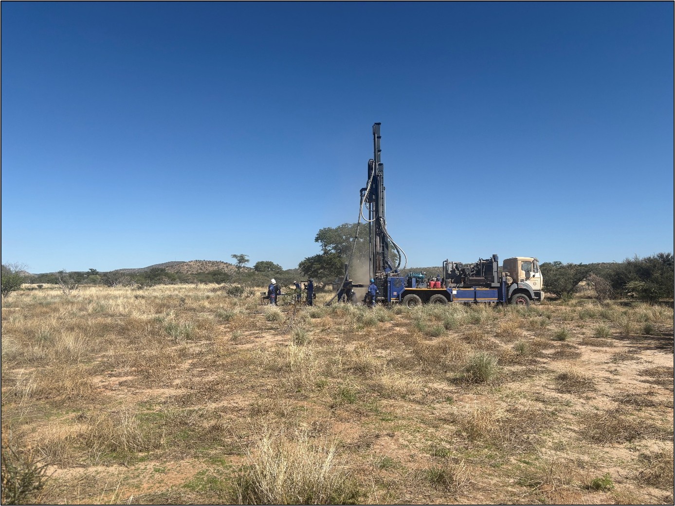 RC drill rig in the process of doing bedrock sampling on the Plains anomaly.