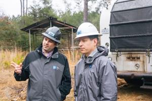 Zefiro Head of Operations Matt Brooks (left) and Chief Executive Officer Curt Hopkins (right) are pictured at the site of a well-plugging project in February 2023.