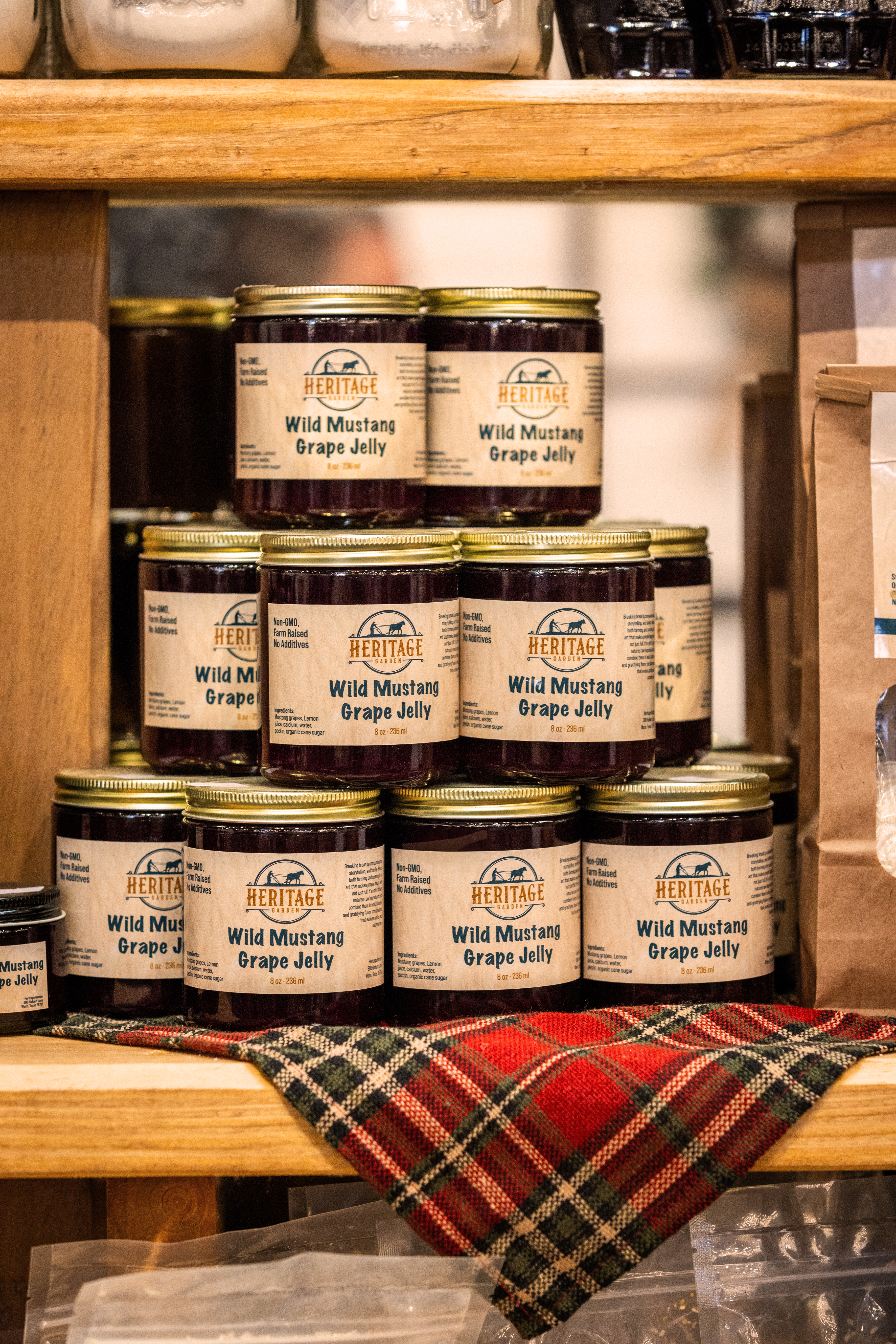 Grape jelly jars stacked on display