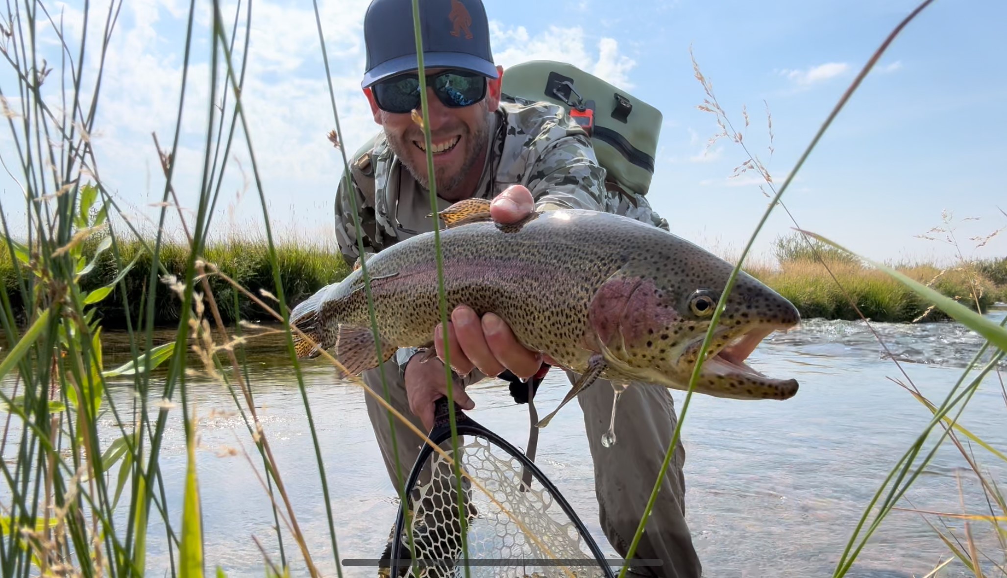 Air Anglers instructor, Flight Paramedic Rusty Chambers, shows off a large rainbow trout during a 2024 fishing retreat.