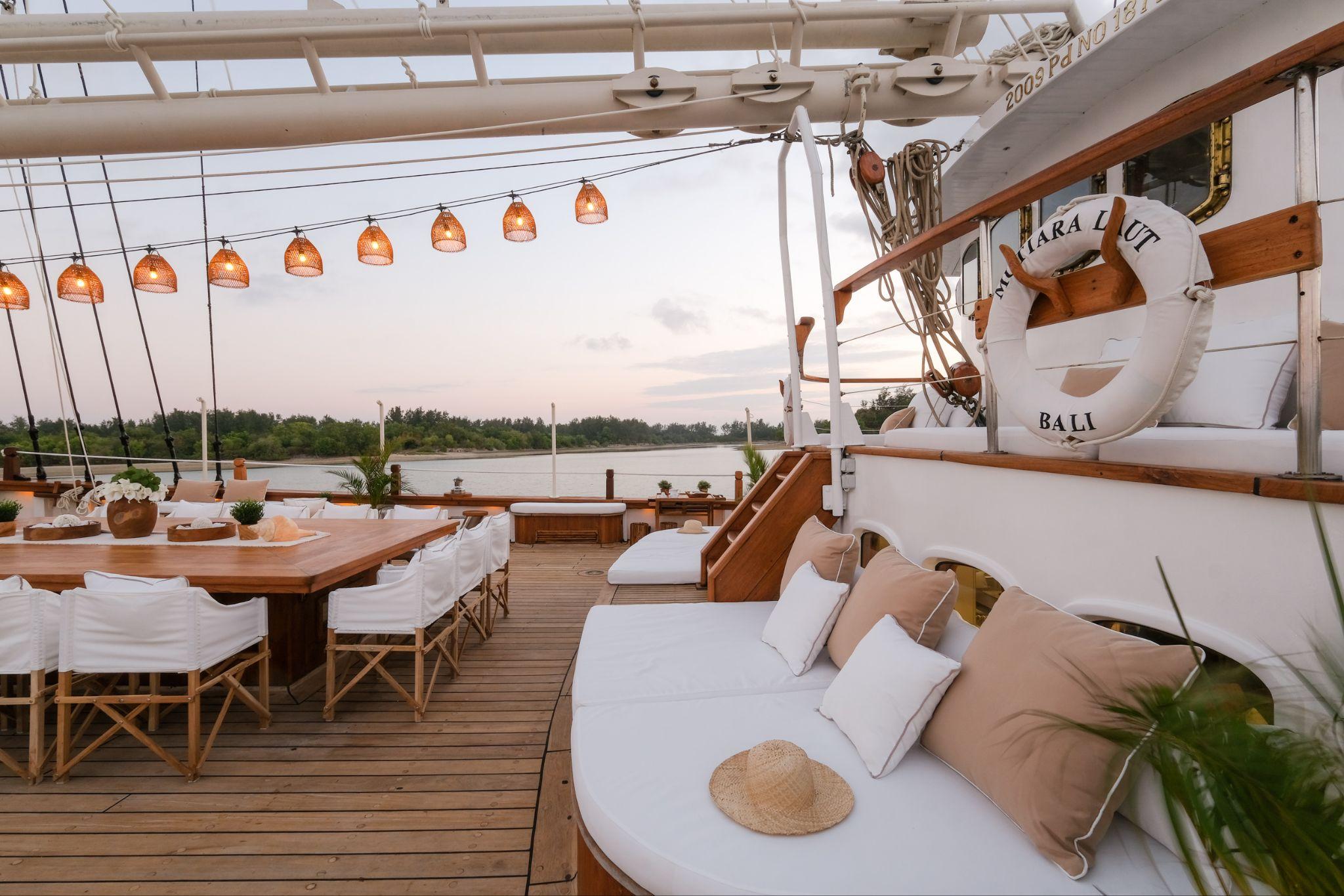 The outdoor deck and lounge area on the luxury charter vessel Mutiara Laut.