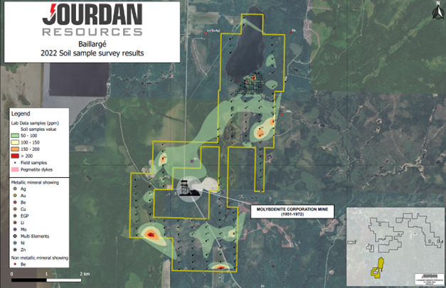 A map with a key showing soil sampling stations and anomalies in warm colours