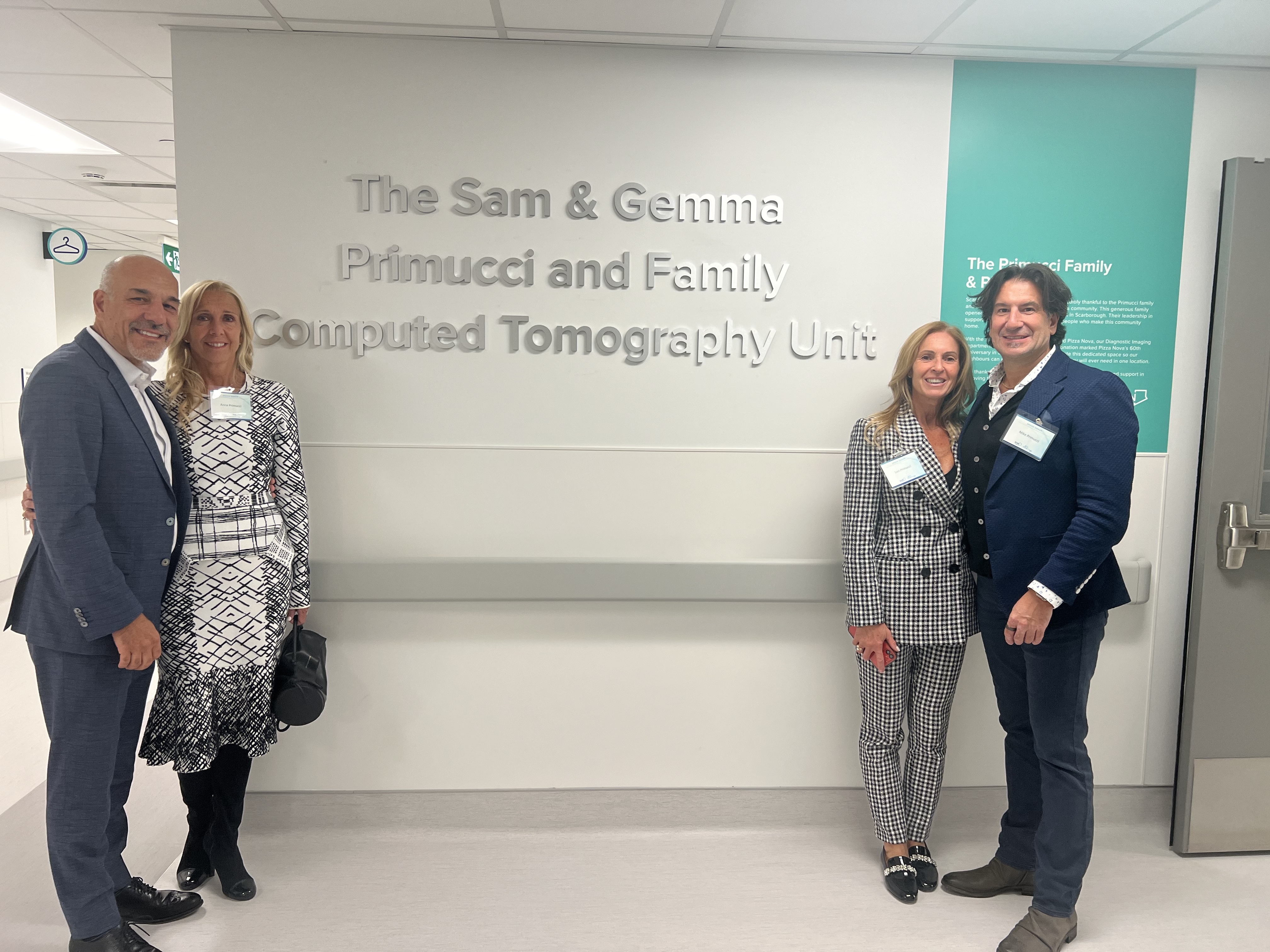 Domenic and Anna Primucci, left, join Lori and Mike Primucci, right, to celebrate the unveiling of The Sam & Gemma Primucci and Family Computed Tomography Unit, February 10, at the new Northpine Diagnostic Imaging Department at Scarborough Health Network (SHN). PHOTO: Pizza Nova.