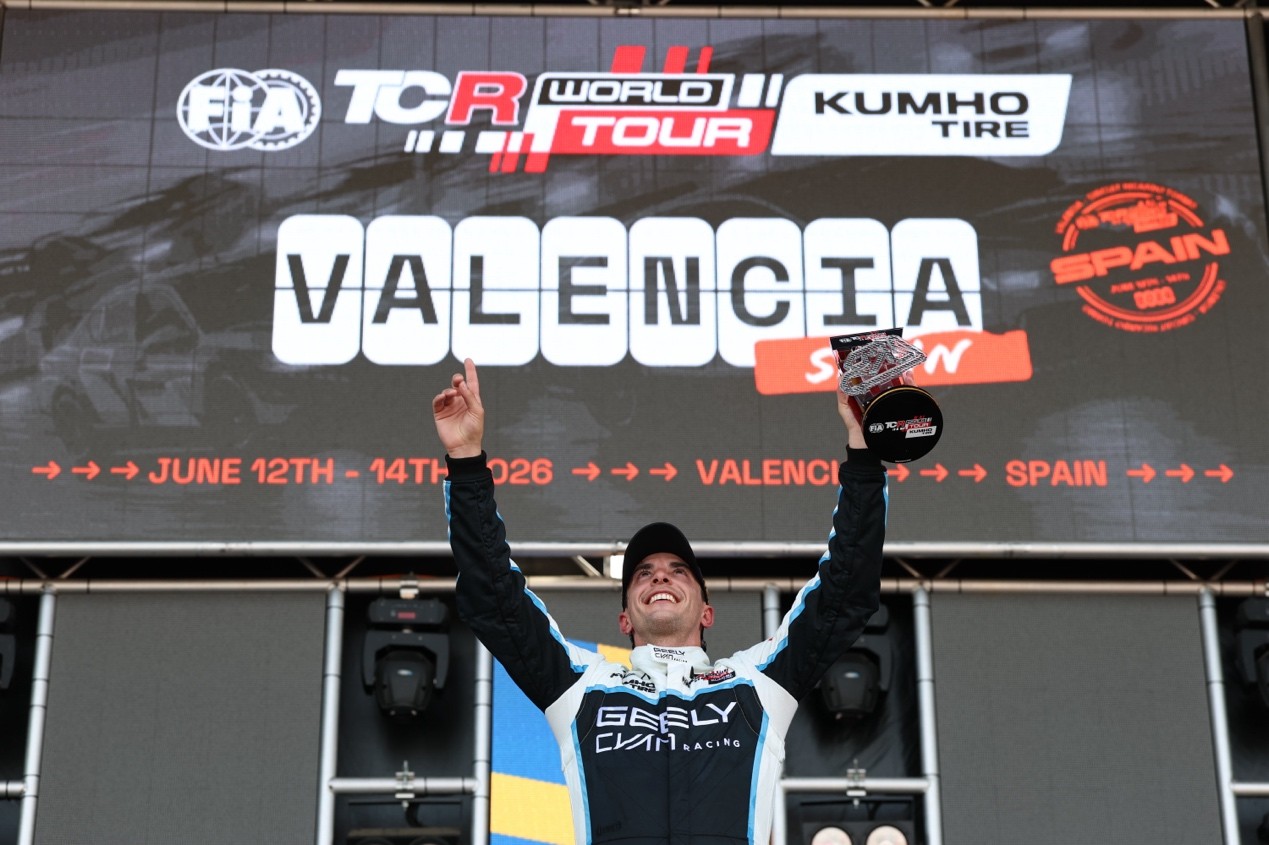 Santiago Urrutia celebrates his record-breaking triple win at Valencia.