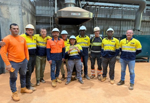 Robex construction team with Managing Director & CEO Matthew Wilcox and Chief Financial Officer Alain William celebrating the first gold pour at Kiniero. 