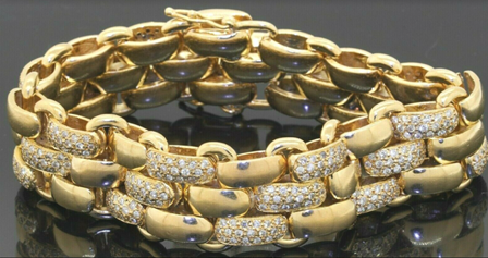 Heavy 18K gold amazing 4.56CTW VS diamond cluster 17.8mm wide link bracelet. Sold at auction for $6,877