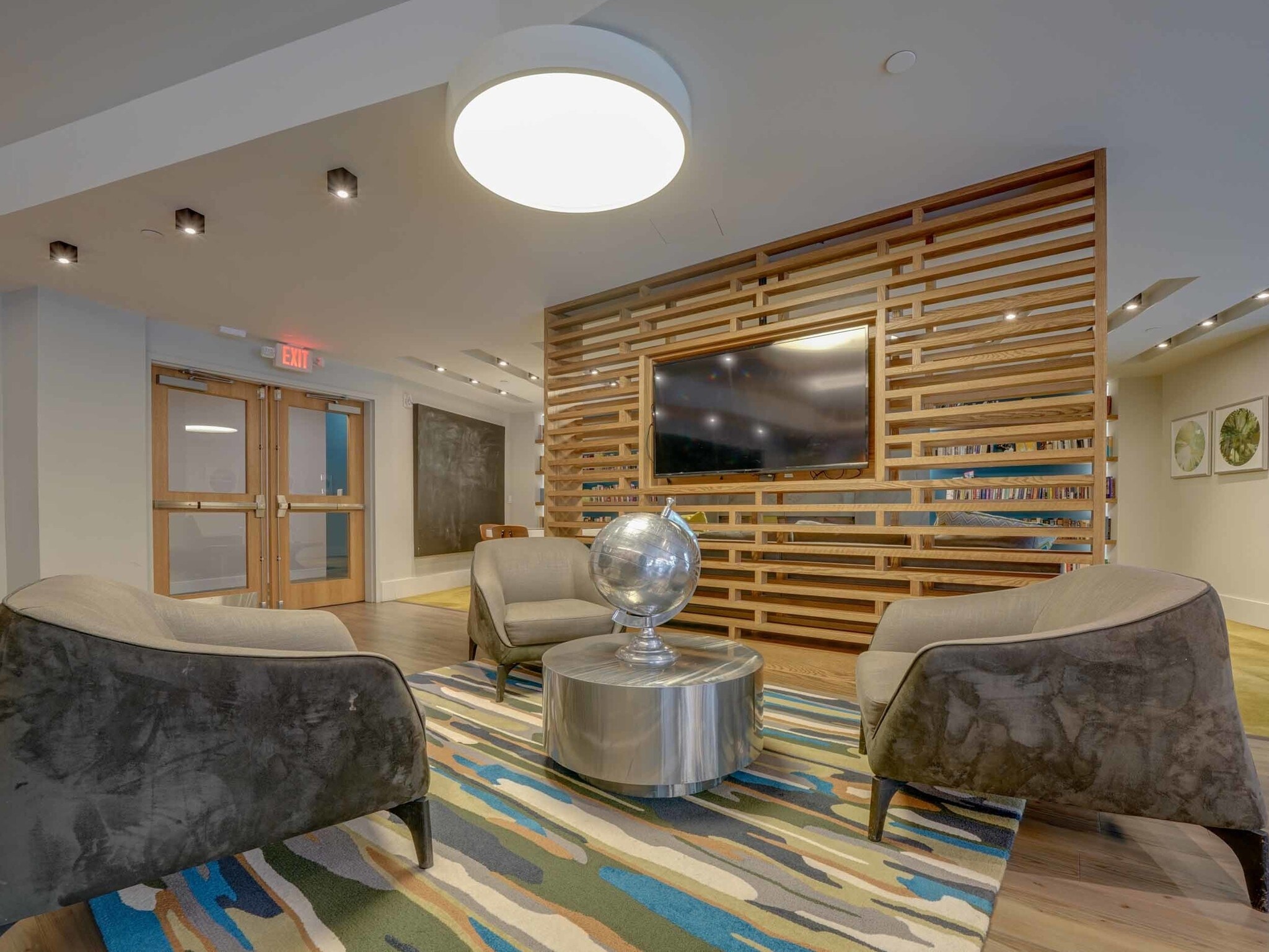 Resident lounge at College & Crown with comfortable seating and entertainment area.