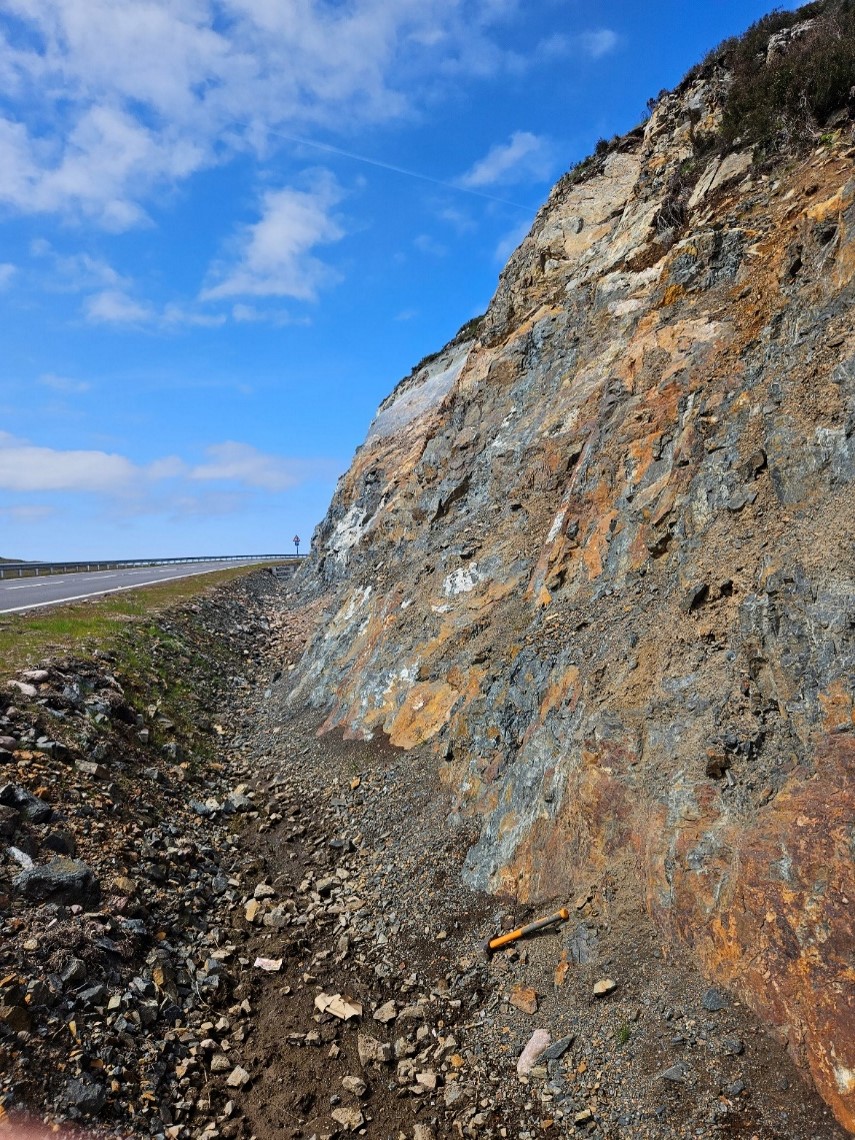 Figure 2: Road cutting where new massive sulphide has been observed in bedrock