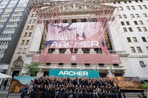 The Archer team gathers in front of the New York Stock Exchange