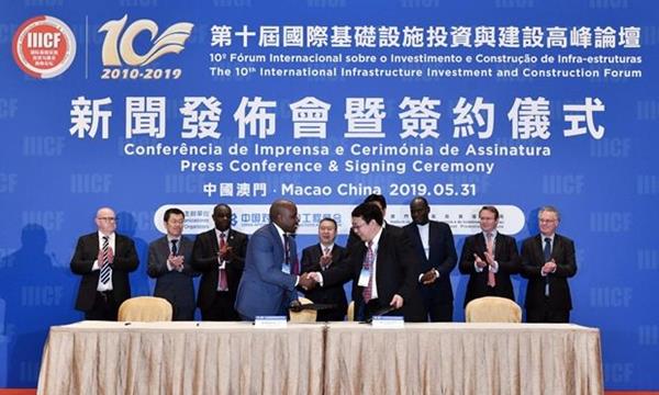 Figure 1: Segun Lawson, CEO and President of Thor Explorations and Jianyi Wei, General Manager of the 4th International Engineering Department, Norinco International, exchange signed contracts at the signing ceremony held in Macao, China.