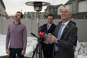 Gov. Cox, far right, pilots a Teal drone under the supervision of Teal founder and CEO George Matus, far left.