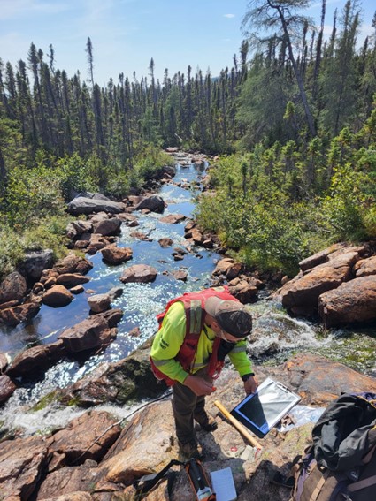 Len Gal conducting structural mapping on the Double Mer Property