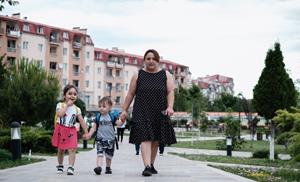 Elina Hurumyan walks her two children Anush and Armen to kindergarten. Credit: Areg Balayan
