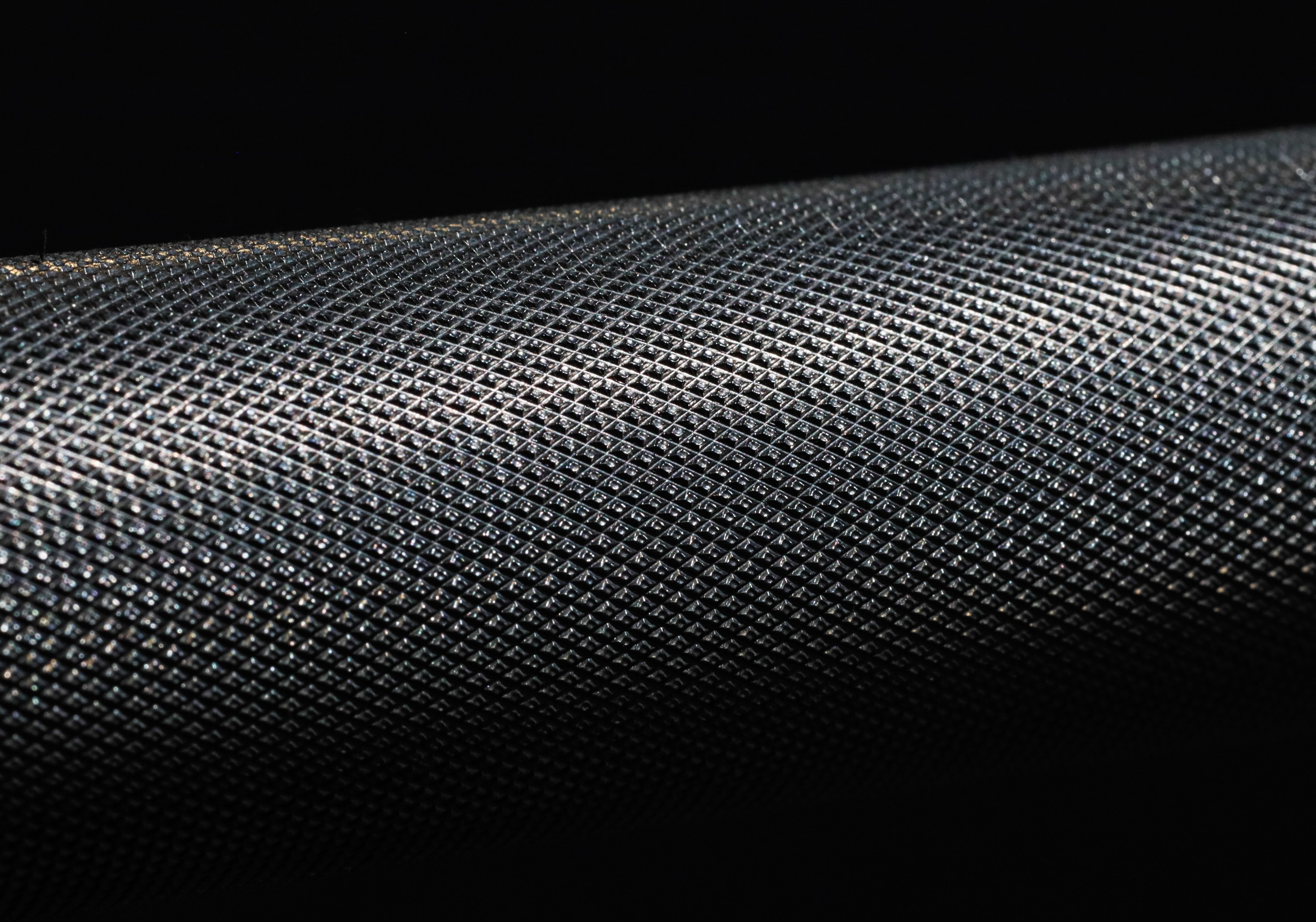 A close up of The Chewy Bar's aggressive 20 Teeth Per Inch (TPI) knurl for unmatched precision and grip