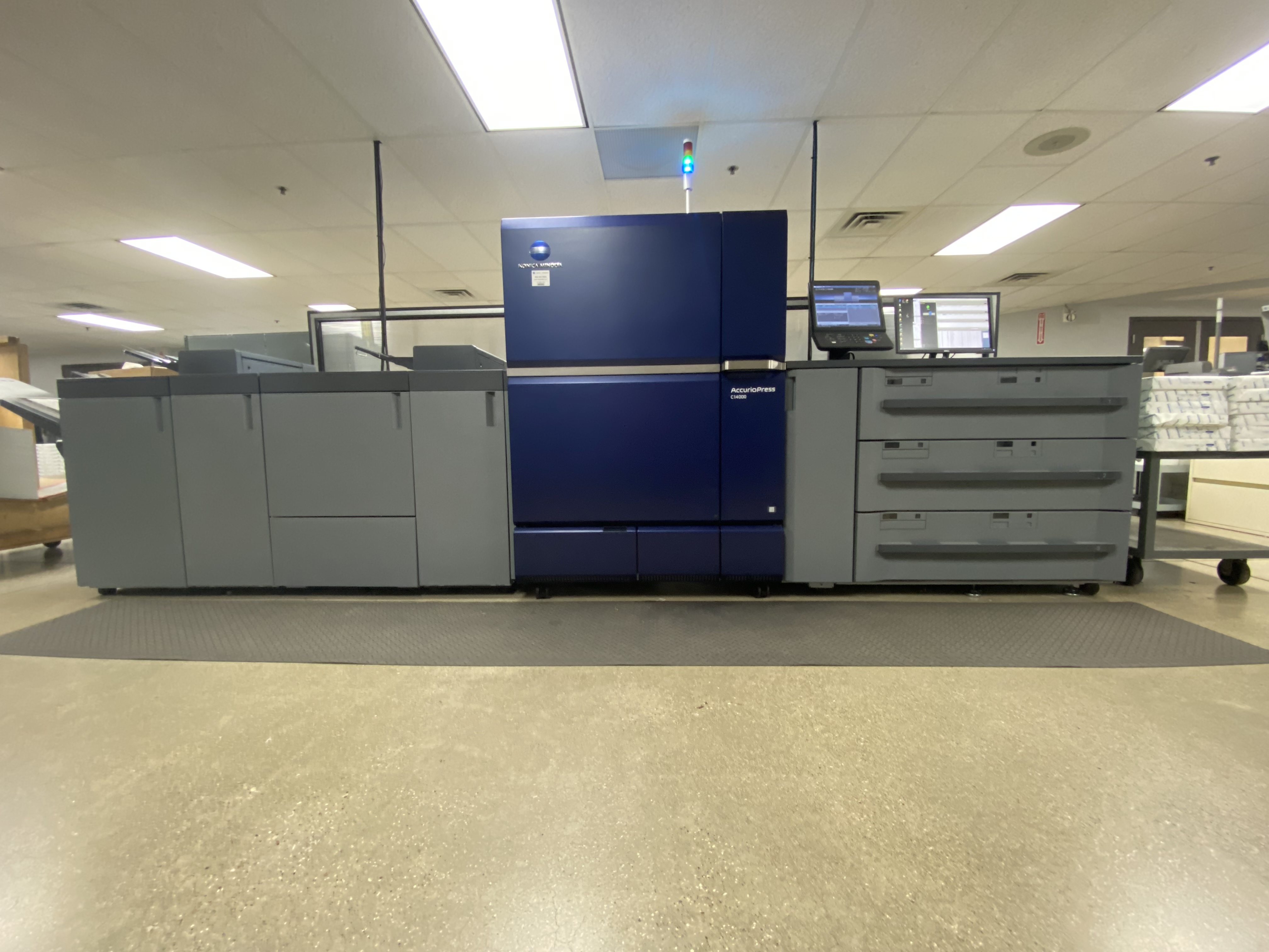 OneTouchPoint's newly installed Konica Minolta C14000 high-volume production press