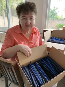 Jeanine Mattson, Handmade with Love Volunteer, with 648 paracord bracelets she crafted for Operation Gratitude. Photo courtesy of Jeanine Mattson and Operation Gratitude