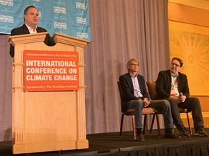 Heartland Institute President James Taylor leads a discussion with Wolfgang Müller and Holger Thuss of the European Institute for Climate and Energy at the 14th International Conference on Climate Change in Las Vegas in 2021.