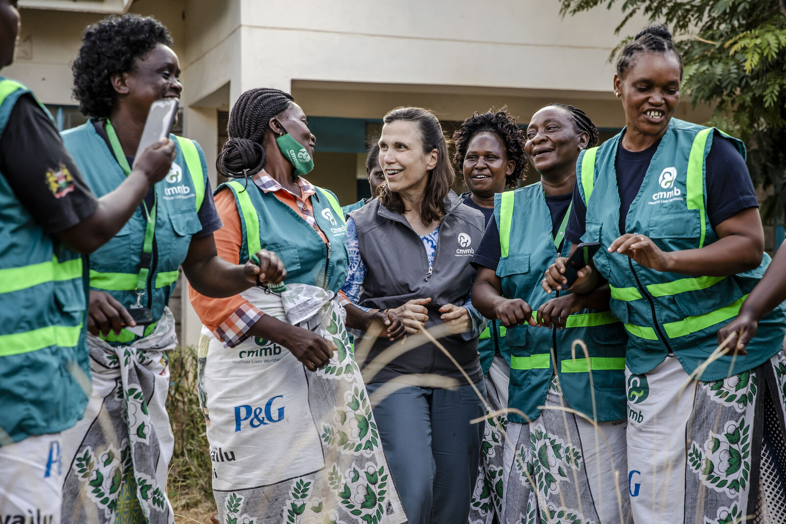 CEO and President Mary Beth Powers with Community Health Workers