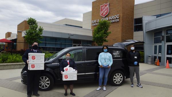 Members of The Salvation Army Kroc Center in Camden and LogistiCare’s transportation provider SJSL Specialty Transport began a food delivery program on Friday, May 8 to deliver food to food-insecure members of the Camden community impacted by COVID-19. From left to right: Captain Brennen Hinzman, Kroc Center Corps Officer; Lieutenant Amarilis Ayala, Associate Kroc Center Corps Officer; Ashley Wright, President of SJSL Specialty Transport and Anthony Jones.