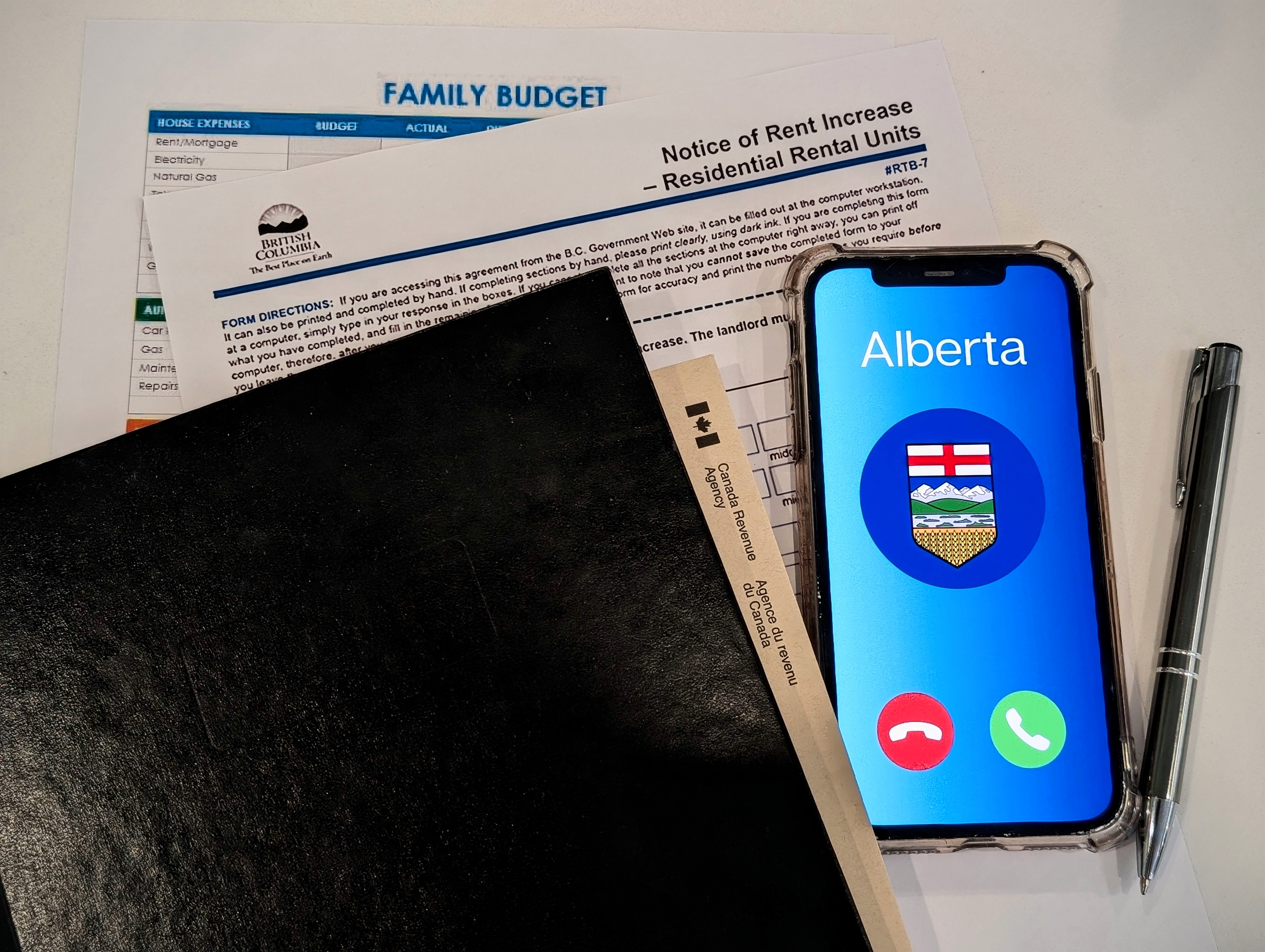 Alberta calling next to family budgeting materials