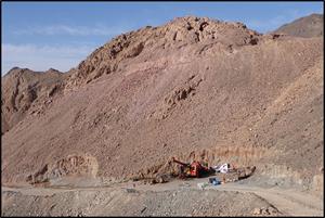 Drilling on hole ROD-053, looking northwest. Much of Aladdin’s Hill above the rig is mineralised to surface, with ancient workings seen at the top