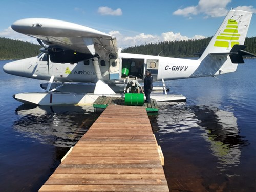 Ryan Green off-loading fuel with the help of Air Borealis, on Saga Metals’ new dock at the Saga Metals Camp.