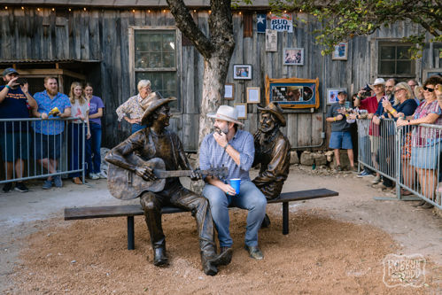 Django Walker (seated) sharing a laugh with Jerry Jeff and Hondo while Hondo’s daughter Cris (standing) looks on.